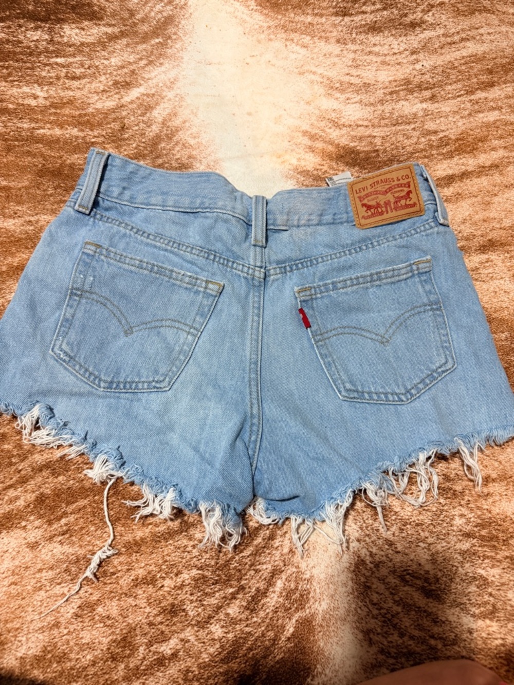 Levi's Light Wash Frayed Hem Denim Shorts